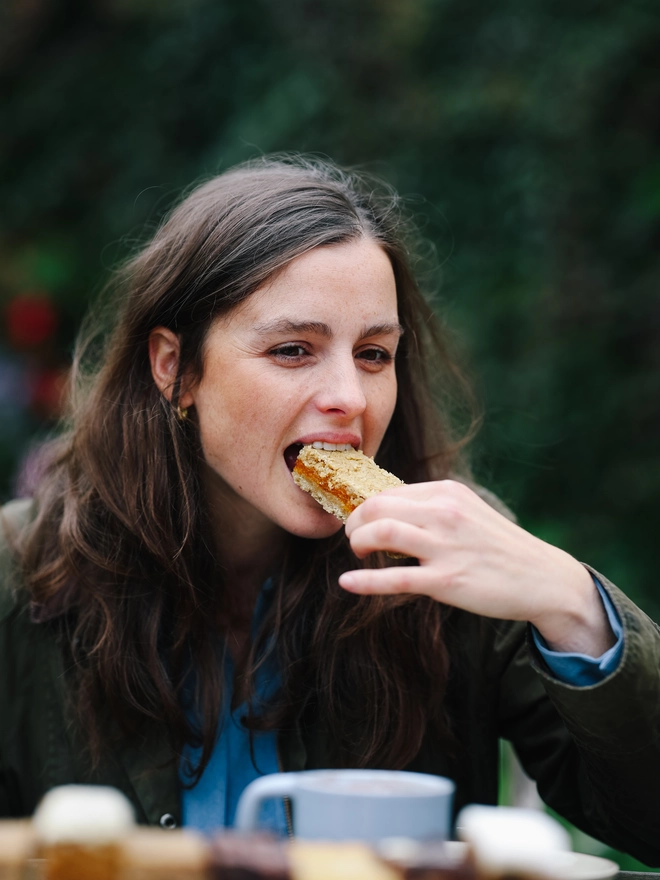 Chloe eating Apricot Oat Slice