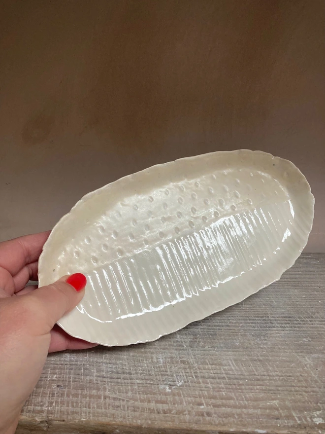 white platter being held