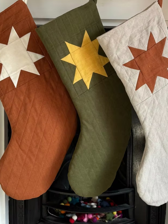 Large Star Linen Quilted Christmas Stockings. A selection of stockings.