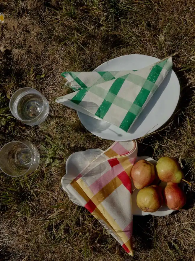 Green gingham napkin on plate