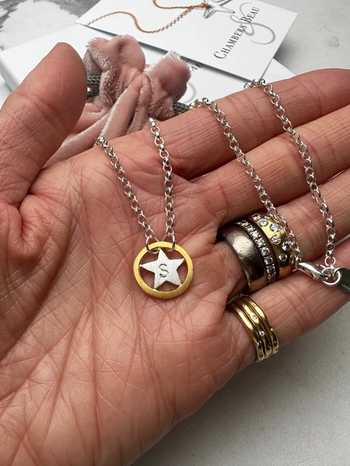 sterling silver and gold plate star charm on sterling silver chain