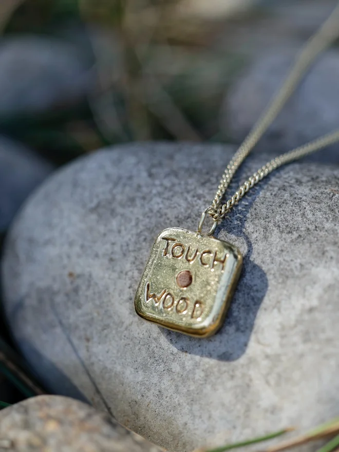 touch wood pipwin pendant necklace