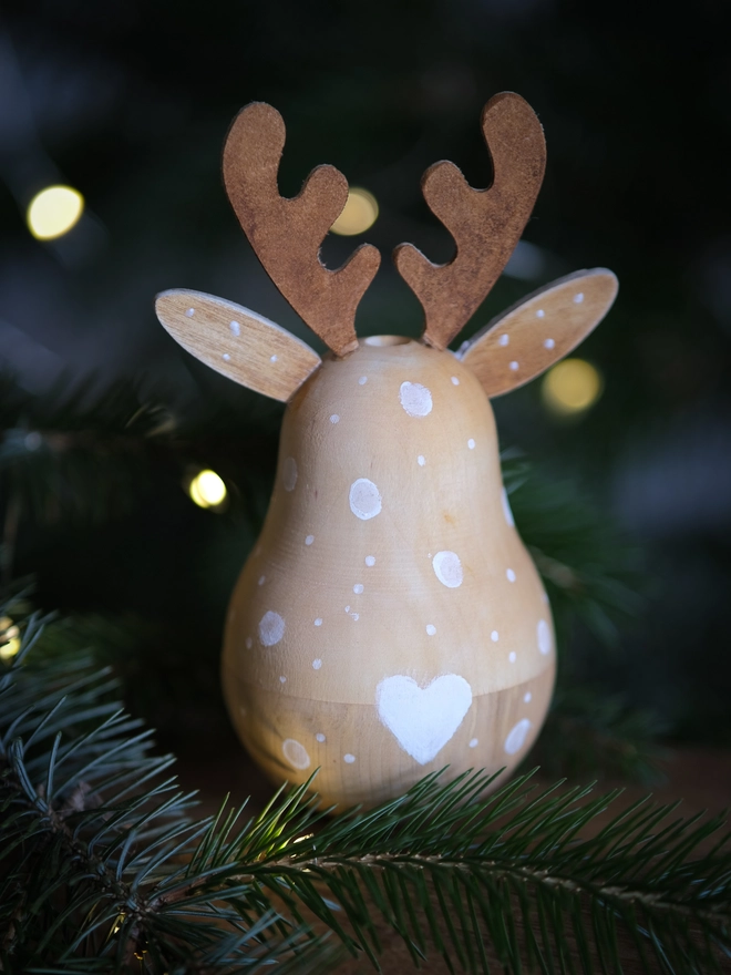 Handcrafted wooden Rudolph Christmas decoration opened to reveal a tiny “Dear Rudolph” note, 