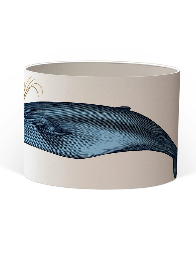 Handmade blue whale lampshade with gold details featuring vintage inspired ocean artwork