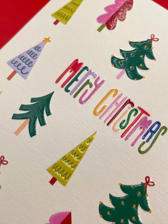 ‘Merry Christmas’ Colourful Christmas Trees Pattern Christmas Card | Raspberry Blossom