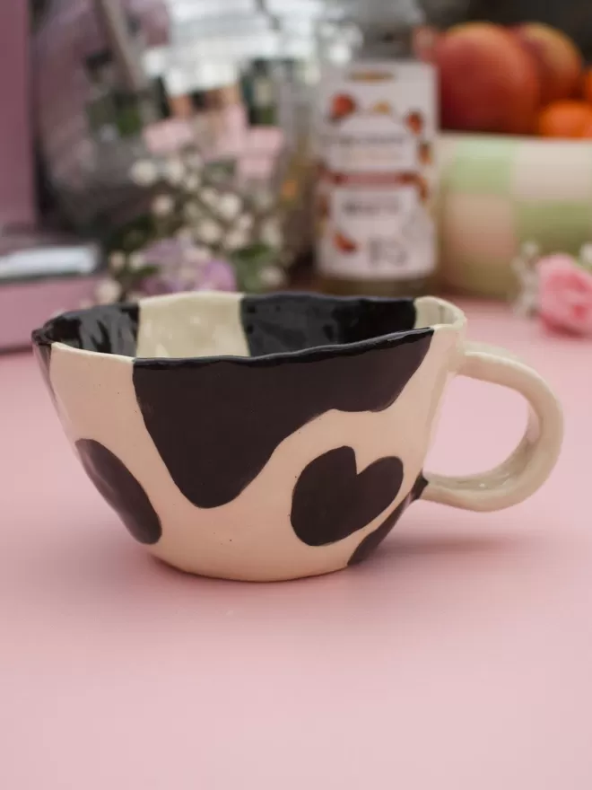 Black and white cow print handmade stoneware pottery mug