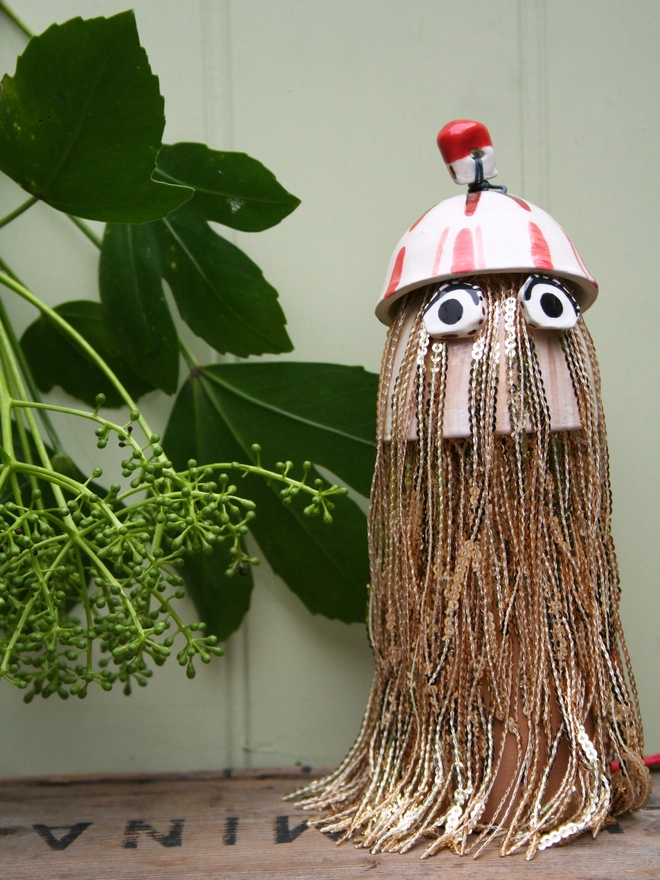 ceramic handmade Christmas tree topper decoration. gold sequin fringing tassels and bobble hat. Disco Thing