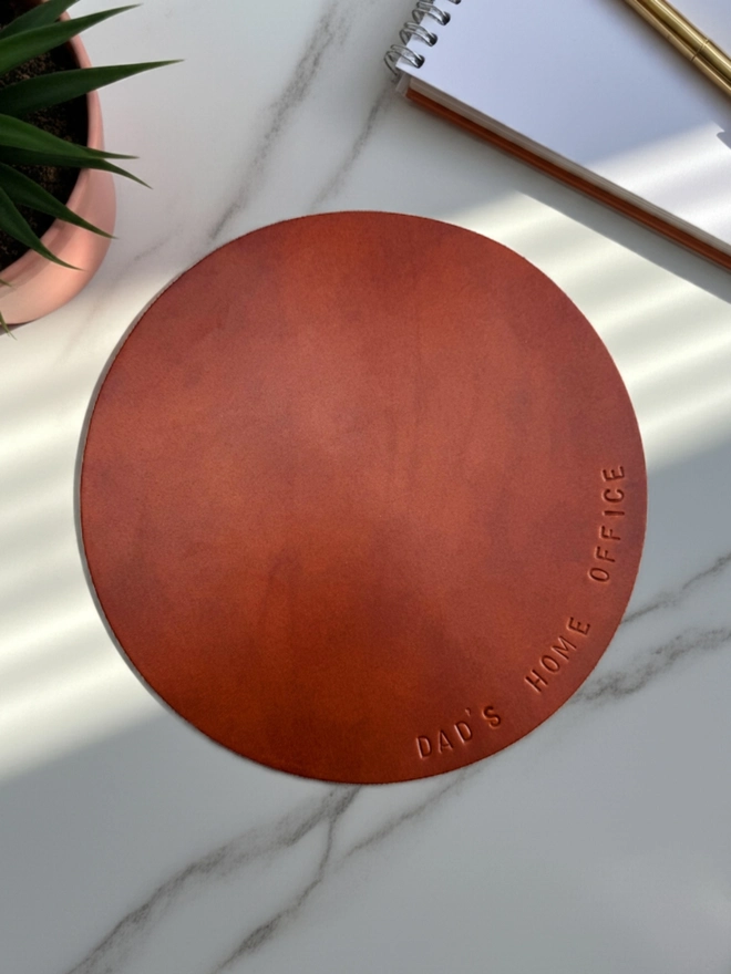 tan leather mouse mat.