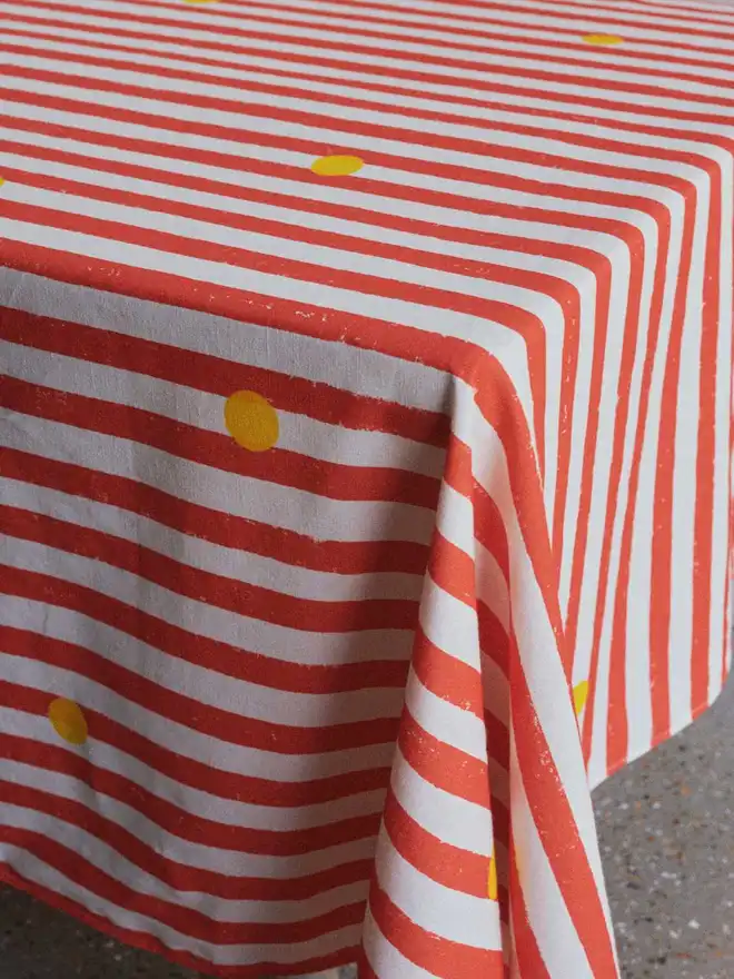 Red stripe and yellow dot tablecloth 