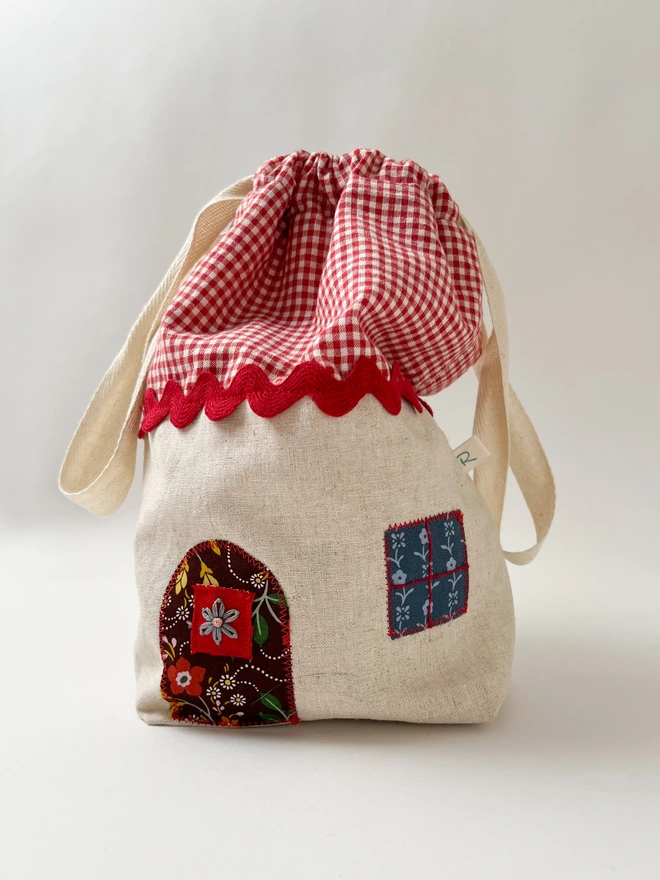 front view of red roof bag
