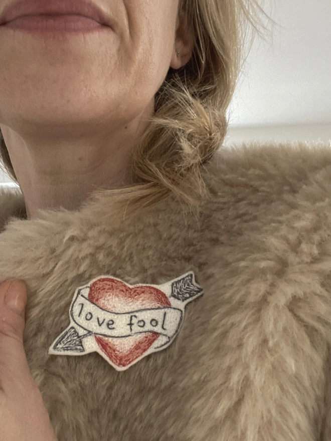 Embroidered Heart Brooch on fur coat