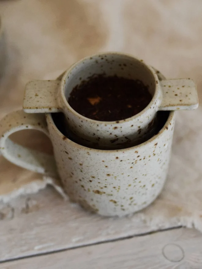 stoneware tea strainer and mug