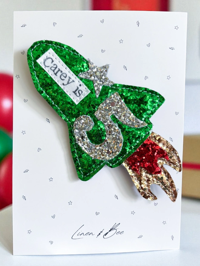 Personalised rocket glitter birthday badge