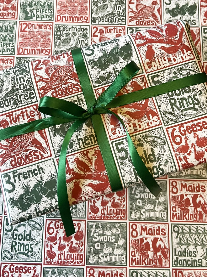 Twelve days of Christmas linocut gift wrapping paper by Kate Guy