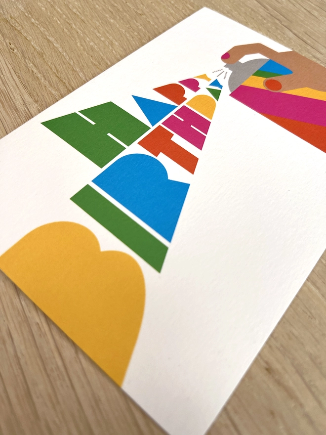 Happy Birthday card with a multi-coloured spray can