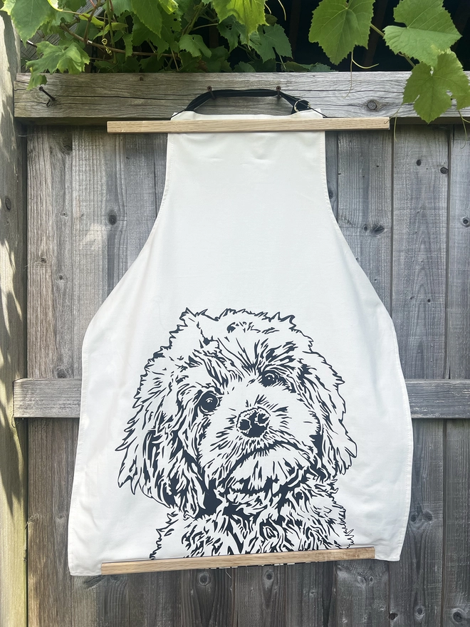 Natural cotton apron illustrated with  cockapoo's face.