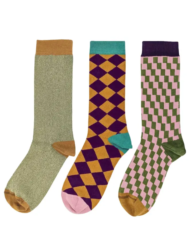 Women's Organic Cotton Ankle Socks Packs (Sets Of 3), a pack of three colourful patterned socks sitting on a plain white surface. 