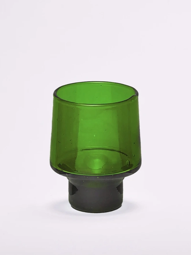 Tall Green Flower Arranging Items (Set Of 2), a green vase sitting on a white surface against a plain backdrop. 