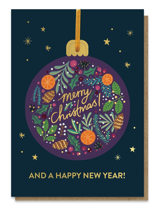 Close up of pop-out bauble card with a festive foliage illustration on it.
