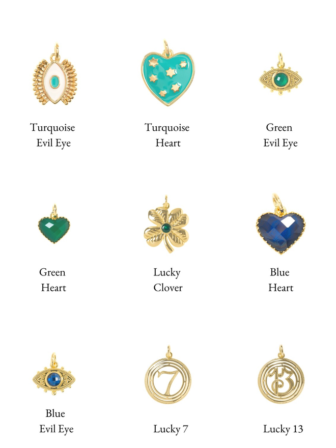 Selection of blue, turquoise and green evil eye, heart, clover and lucky number charms