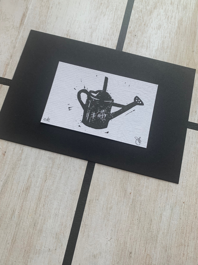 watering can linocut print