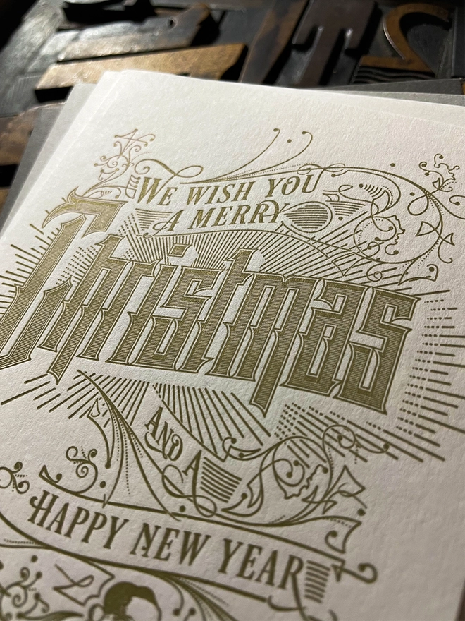 Spread festive cheer with this charming vintage Santa letterpress Christmas card! These cards are printed with my own fair hands on my 1915 Arab Crown Folio Press. Printed in metallic gold ink.