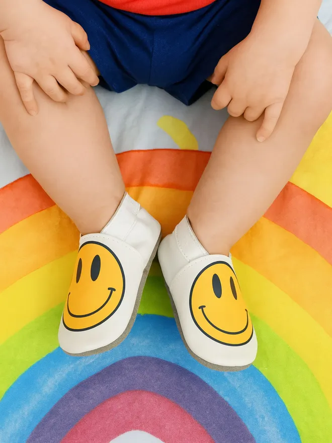 yellow smiley face baby shoes