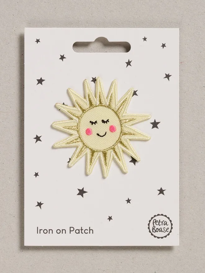 Sunshine embroidered fabric patch with an iron-on backing.