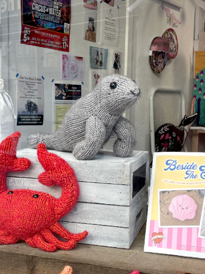 Seal Knitting Kit. A completed knitted seal.