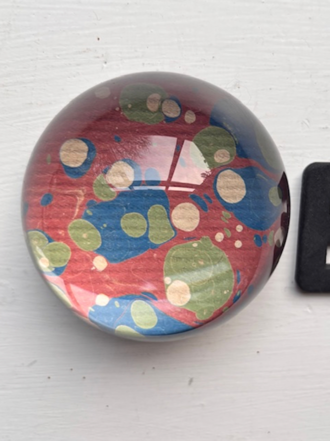 Small Paperweight. A paperweight in E