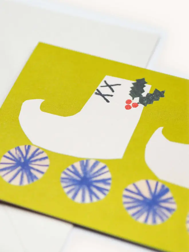green card with christmas rolle skate design