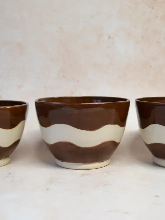 Handmade ceramic Ripple Mugs — pair in brown and cream wavy design
