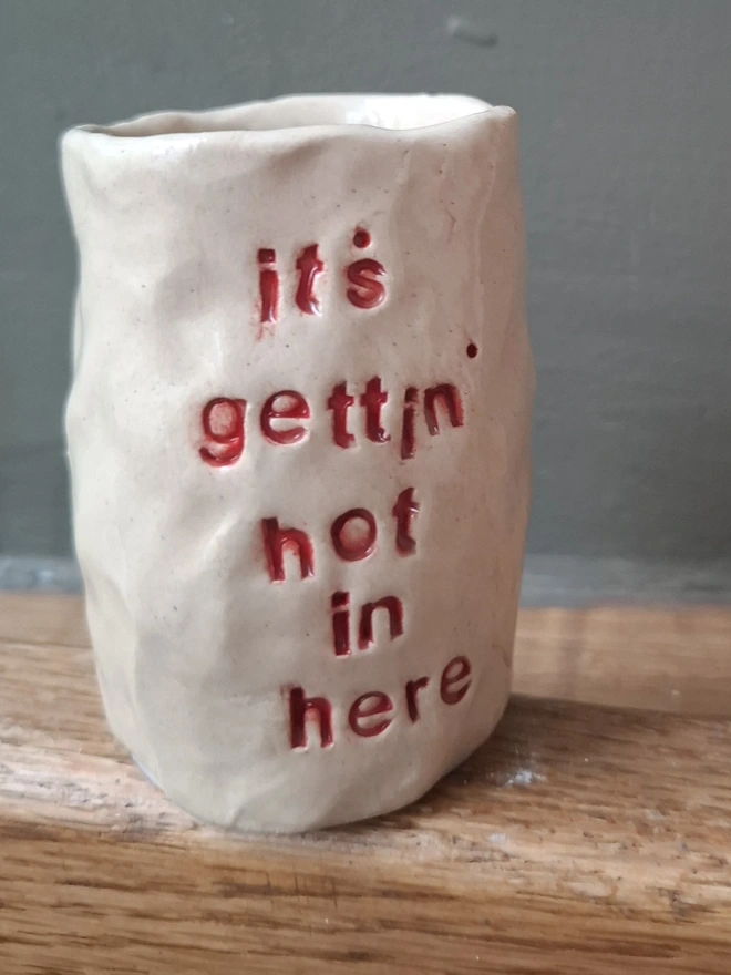 Ceramic Match Holder with the phrase 'Its getting hot in here' stamped into it 