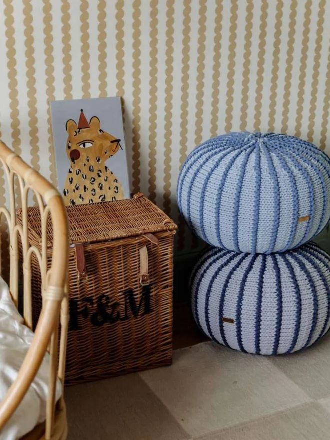 Zuri House. Small denim blue Ziggy pouffe.