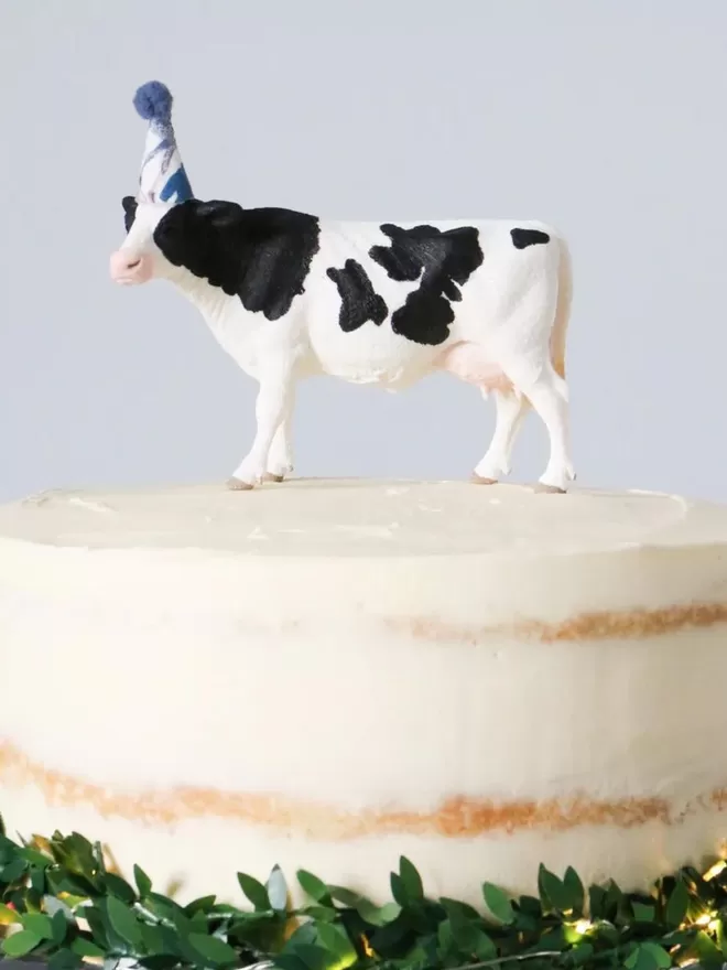 Cow on a cake.
