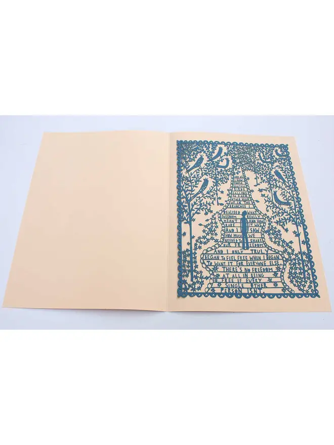 light blue lasercut in a beige folder