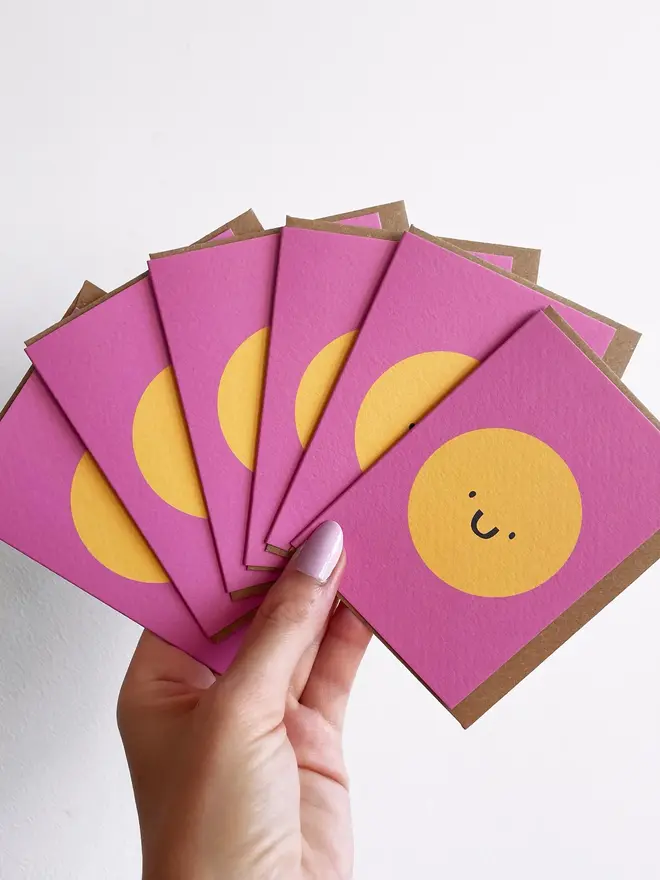 yellow pink smiley face greeting card