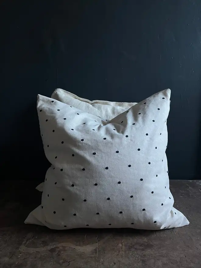 spotty feather filled linen cushions