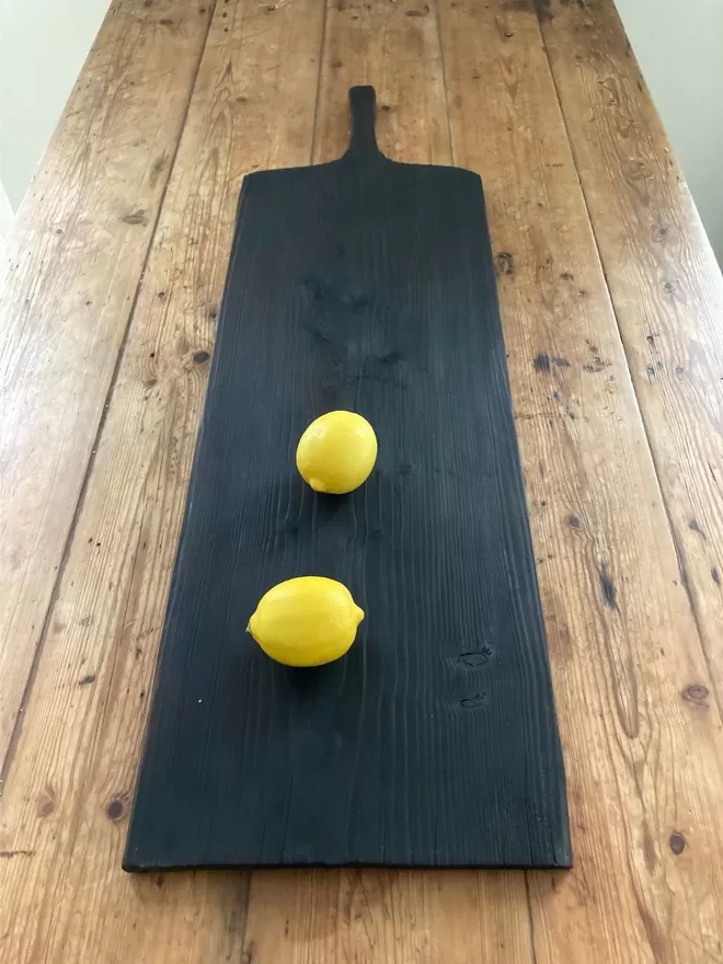 Long Charred Black Serving Board With Lemons