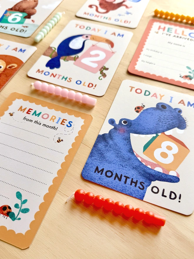 illustrated animal themed baby milestone cards by Emily Nash Illustration- postcard keepsake multipack for babies