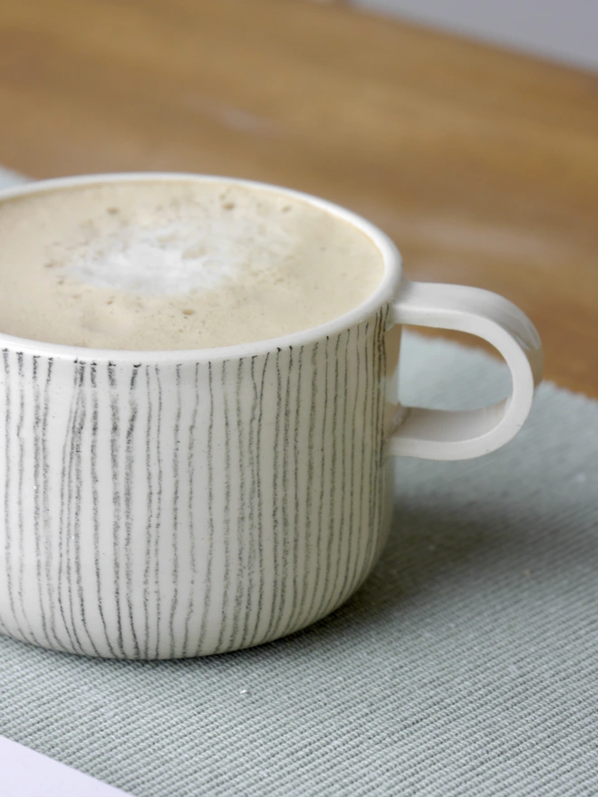 Small handmade striped mug