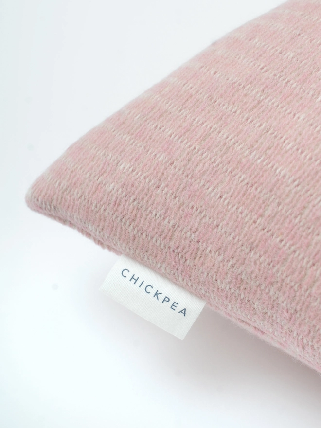 textured pink lambswool cushion