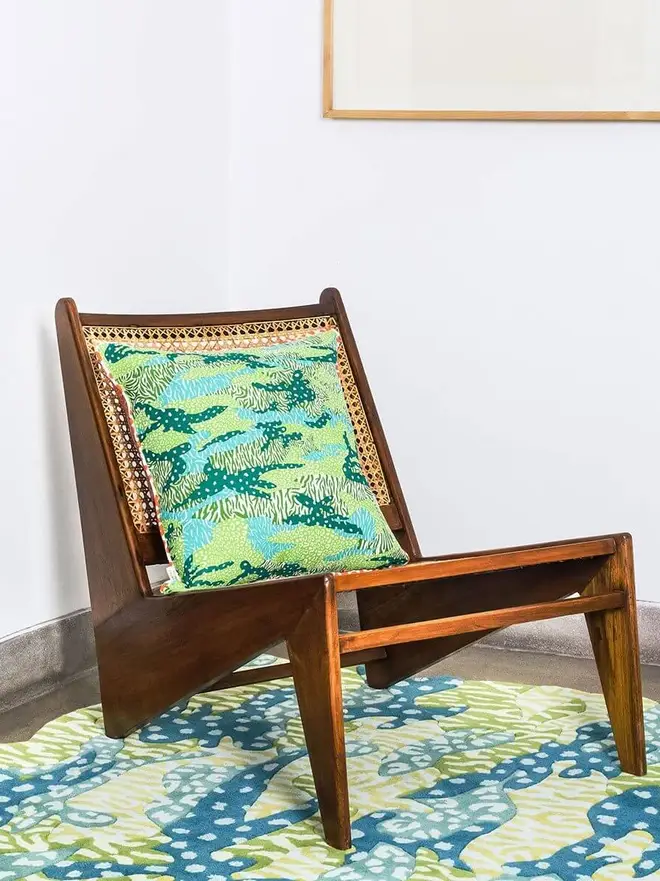 Big Cat Camo Hand Tufted Rug, a colourful rug sitting in a living room. 