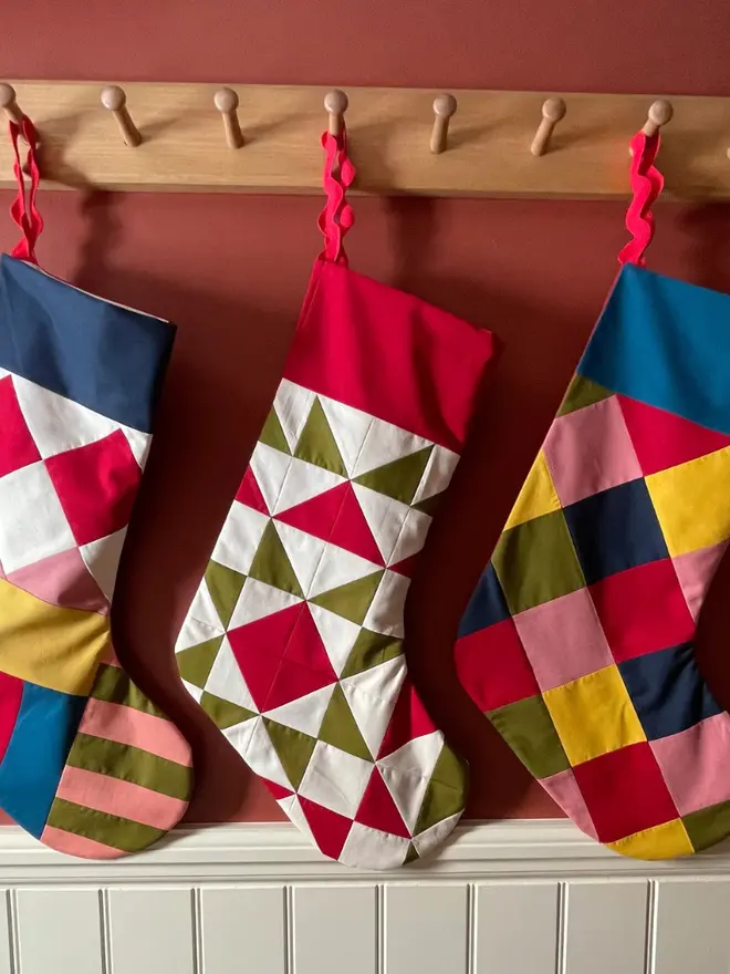 Pagliacci Patchwork Stocking, hanging.