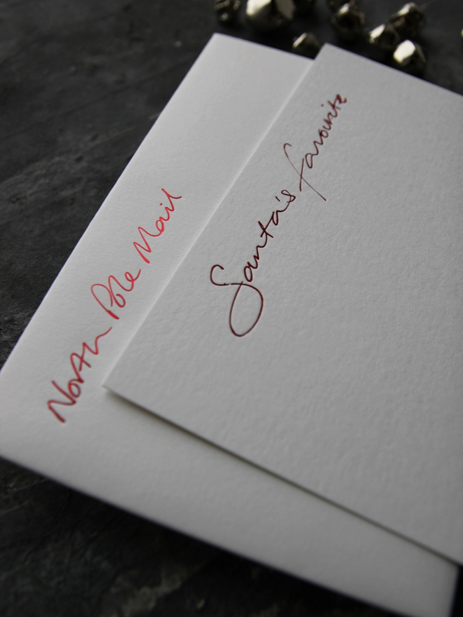 christmas notecard hand foiled in red, says Santa's Favourite, envelope with North Pole Mail hand foiled on it