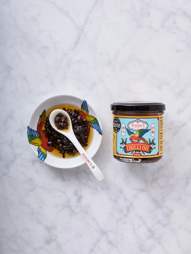 Extraordinary Chilli Oil. A jar of oil with a sample.