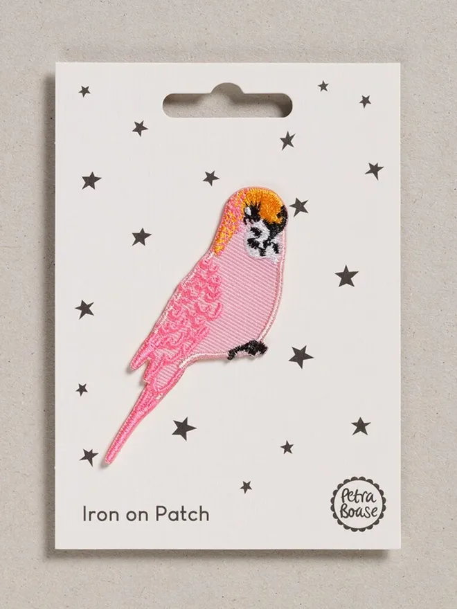 Pink budgie embroidered iron on fabric patch for upcycling.