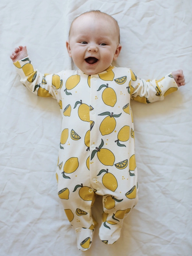 Organic Cotton Baby Sleepsuit in Cream " Lemon Grove " print