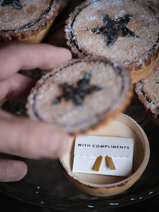 handpainted wooden mince pie with a secret message