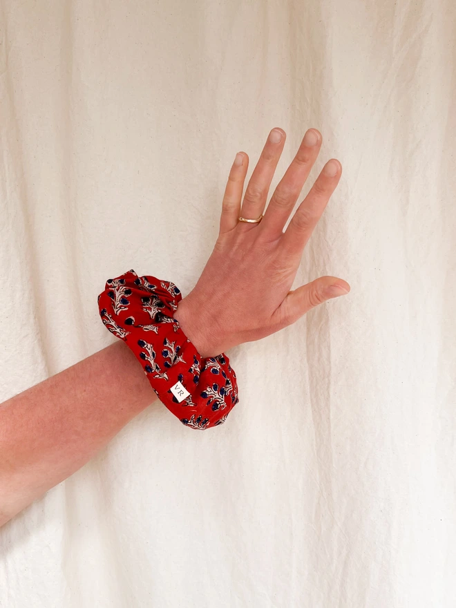Models hair showing large block print hair scrunchie
